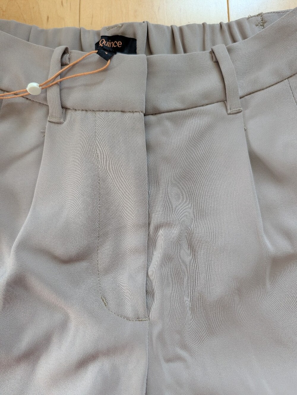 Quince Wide-Leg Pleated Trousers in Beige - Picture 9 of 9